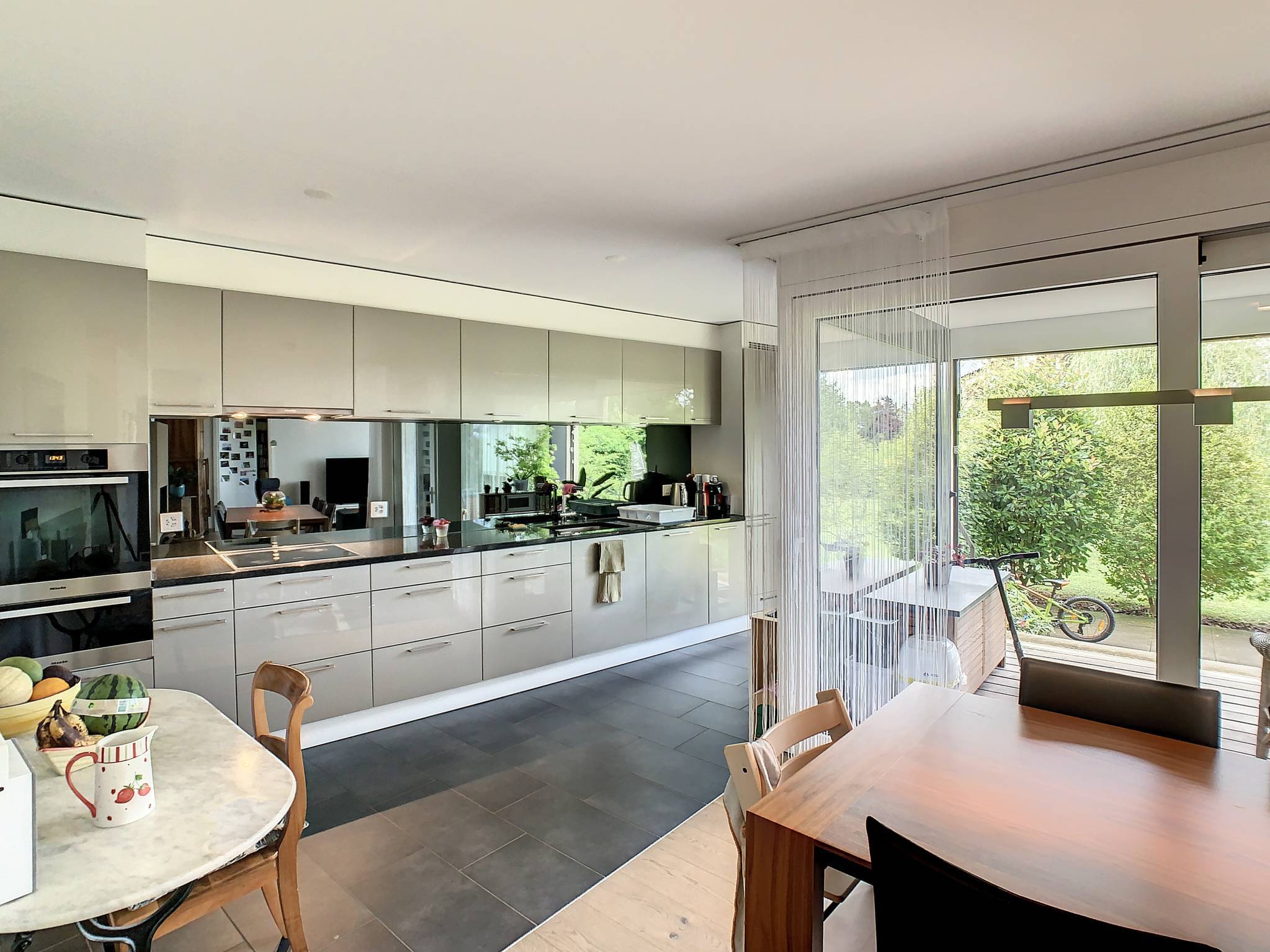 EN EXCLUSIVITÉ Appartement de 5.5 pièces au rez-de-jardin