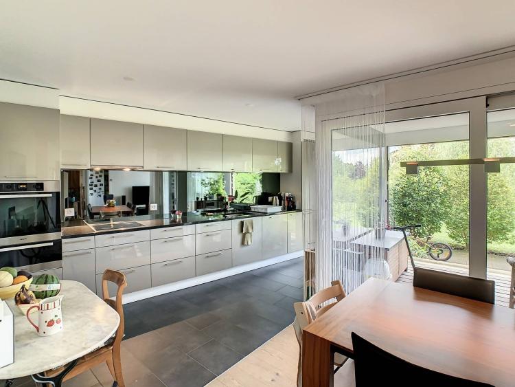 EN EXCLUSIVITÉ Appartement de 5.5 pièces au rez-de-jardin
