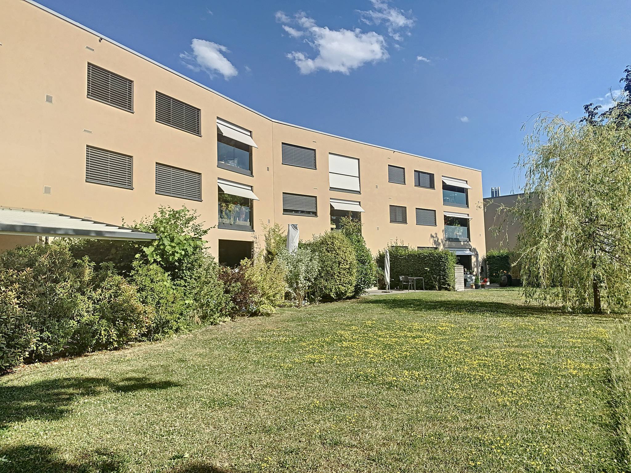 EN EXCLUSIVITÉ Appartement de 5.5 pièces au rez-de-jardin